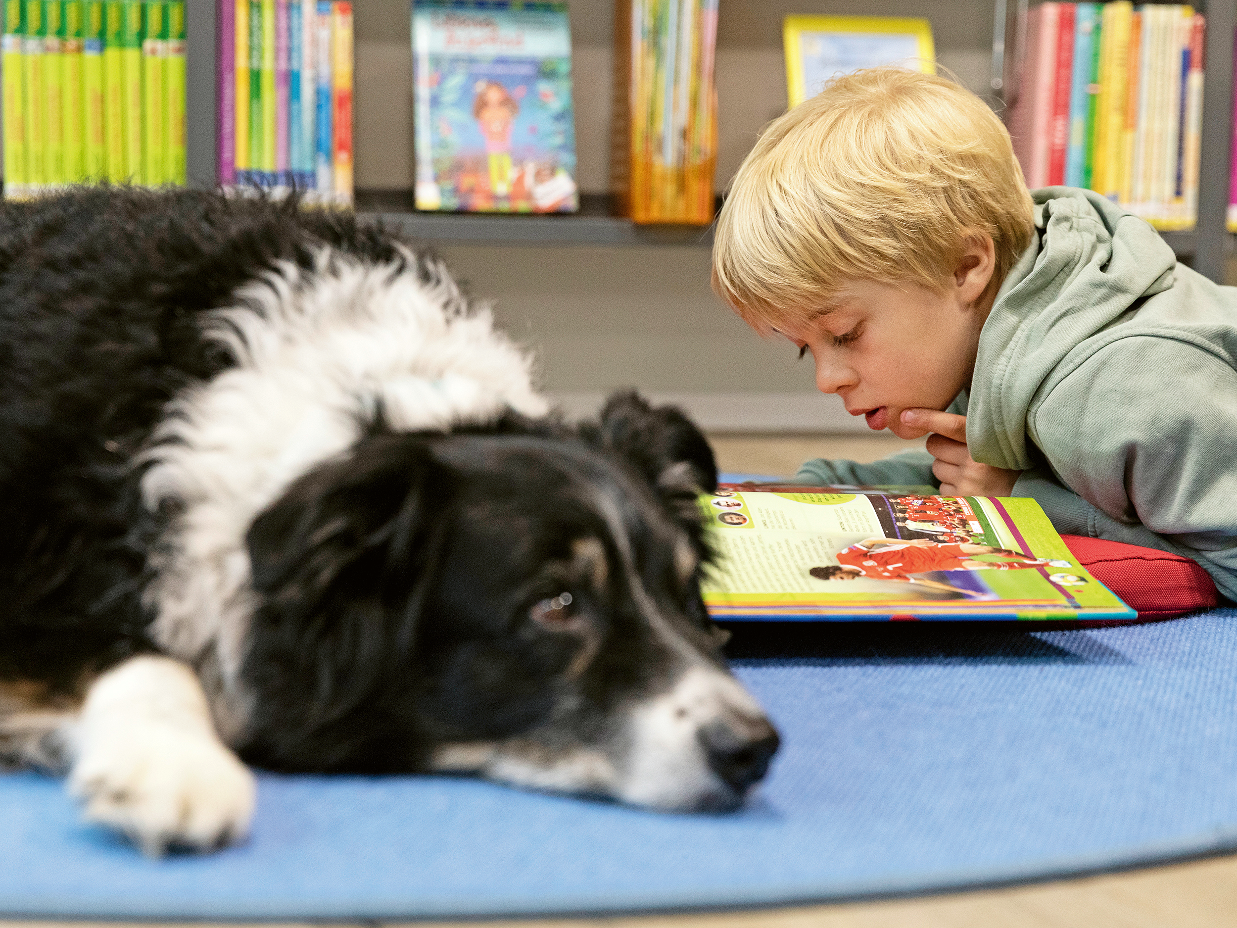A kid with a dog