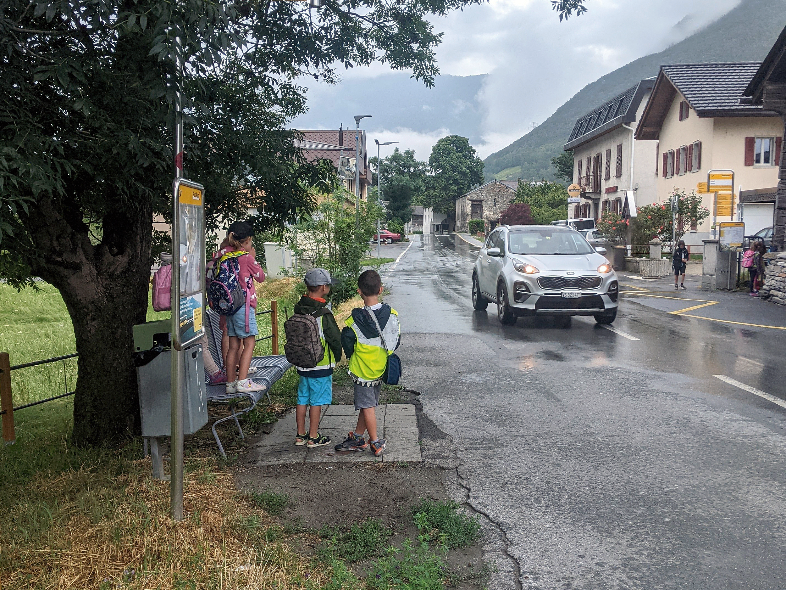 Kids waiting a bus