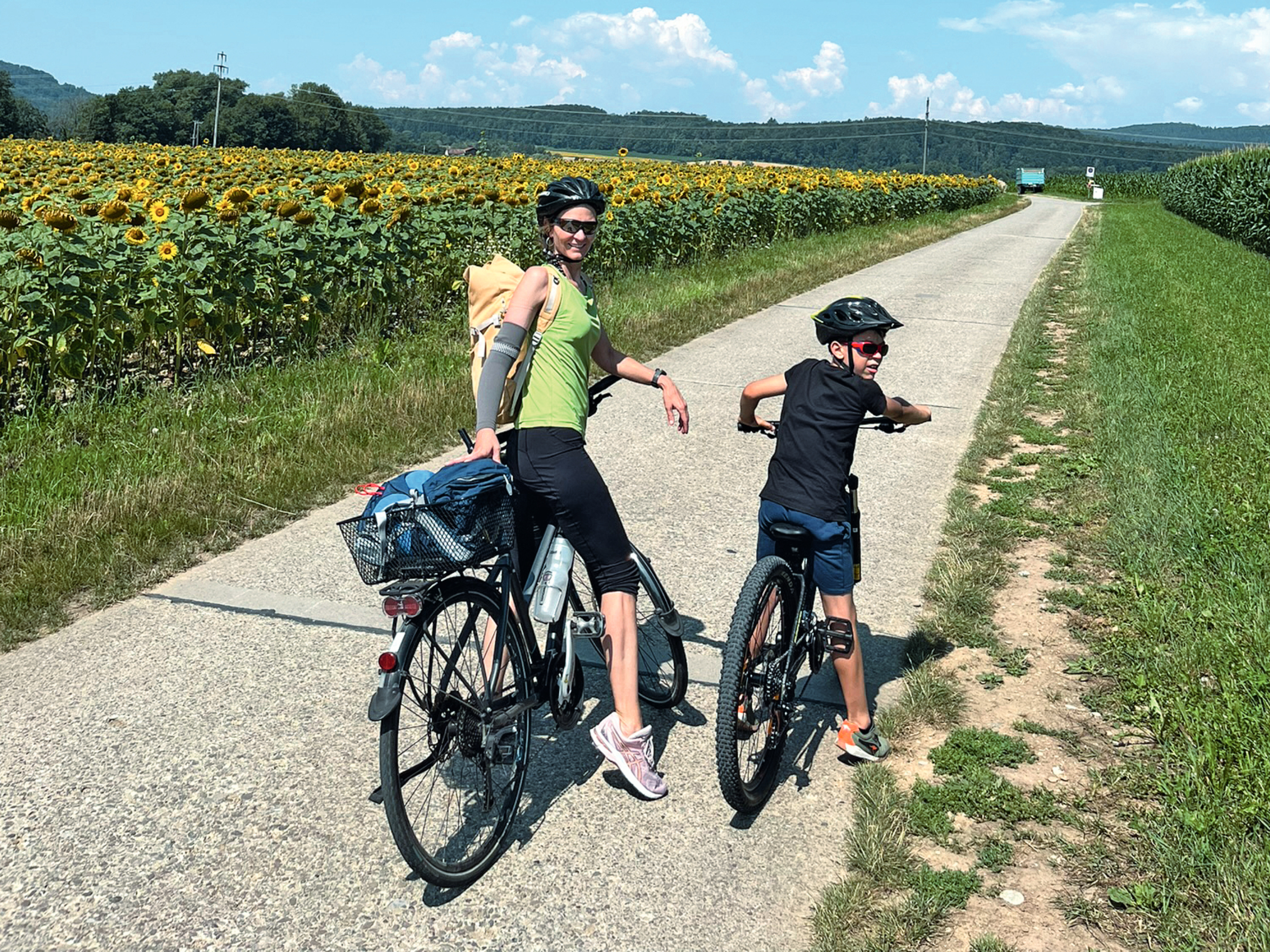 Woman and a child bicycle